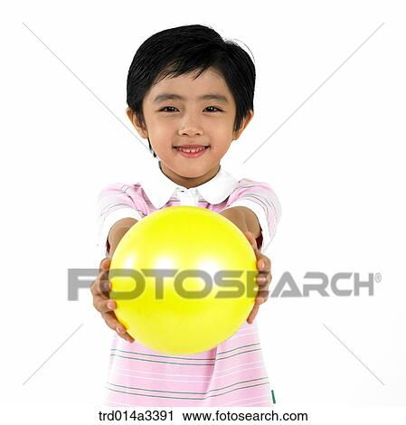boy holding ball View Large Photo Image Stock Image - boy holding ball. Fotosearch