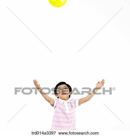 boy playing with the ball View Large Photo Image Stock Photo - boy playing with the ball. Fotosearch