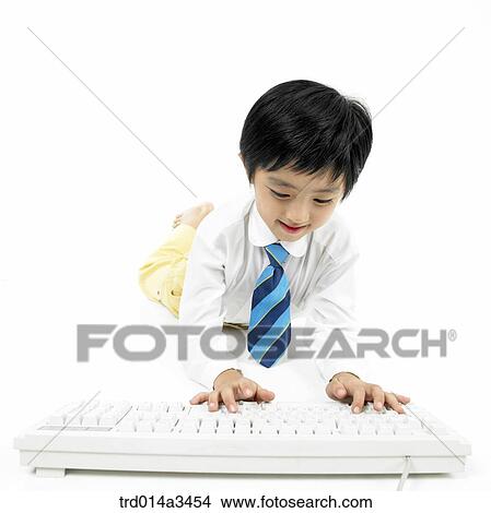 Boys using keyboard View Large Photo Image Picture - Boys using keyboard. Fotosearch