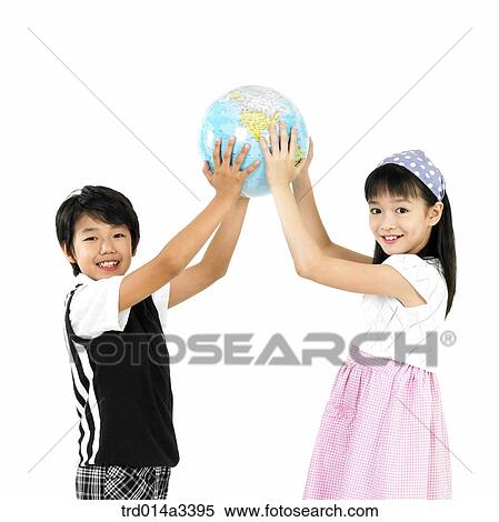 Children holding the globe View Large Photo Image Stock Photography - Children holding the globe. Fotosearch