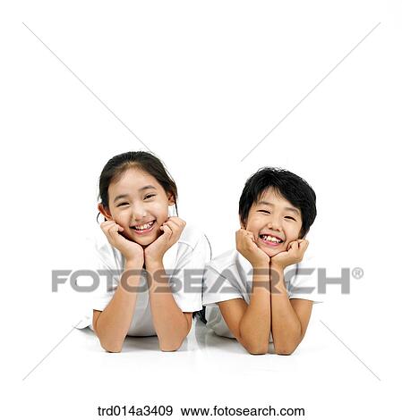 Children lying prone View Large Photo Image Stock Photo - Children lying prone. Fotosearch