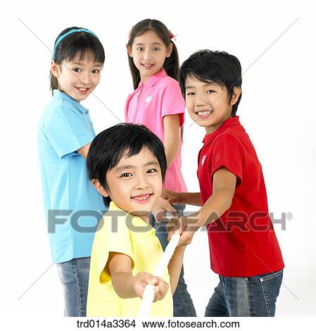 Children playing at tug of war View Large Photo Image Picture - Children playing at tug of war. Fotosearch
