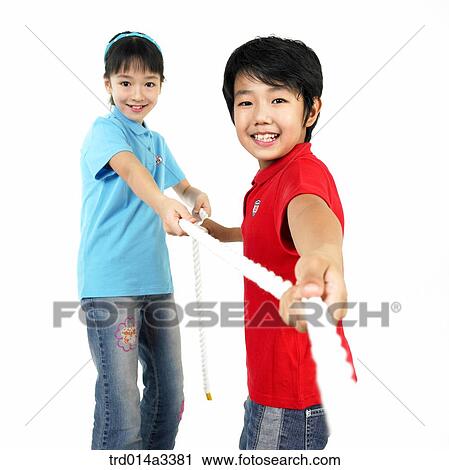 Children playing at tug of war View Large Photo Image Stock Image - Children playing at tug of war. Fotosearch