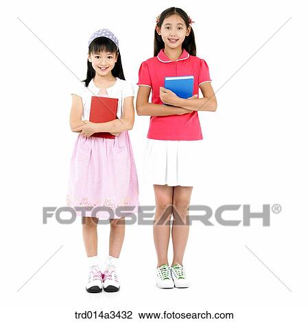 Stock Image - girl holding books. Fotosearch