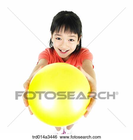 girl holding yellow balloon View Large Photo Image Stock Photograph - girl holding yellow balloon. Fotosearch
