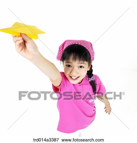 Girl playing with model plane View Large Photo Image Stock Photo - Girl playing with model plane. Fotosearch