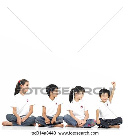 one child raising hand and others are looking at him View Large Photo Image Stock Image - one child raising hand and others are looking at him. Fotosearch