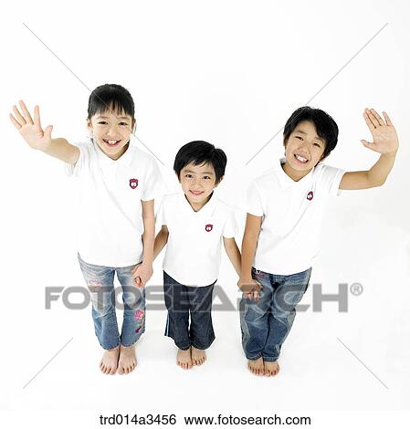 Three children saying hello View Large Photo Image Stock Photograph - Three children saying hello. Fotosearch