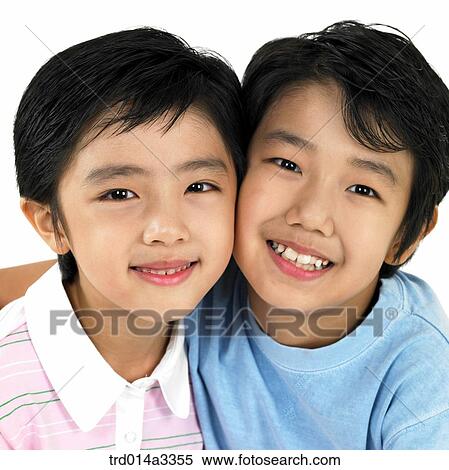 Two boys' face View Large Photo Image Stock Photography - Two boys' face. Fotosearch