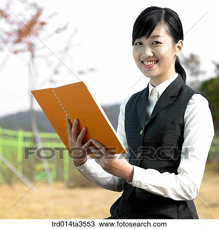side of student reading books View Large Photo Image Stock Image - side of student reading books . Fotosearch