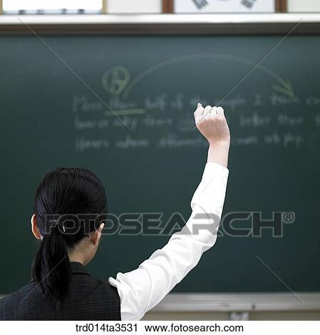 student in uniform raising hand in the classroom View Large Photo Image Stock Image - student in uniform raising hand in the classroom. Fotosearch