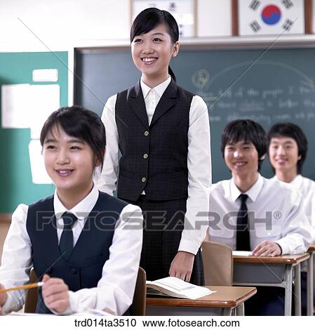Students answerign in her seat View Large Photo Image Stock Image - Students answerign in her seat. Fotosearch