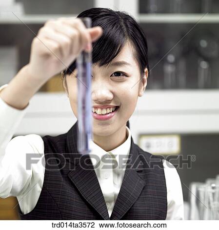 students in uniform doing chemistry experiment View Large Photo Image Stock Image - students in uniform doing chemistry experiment. Fotosearch
