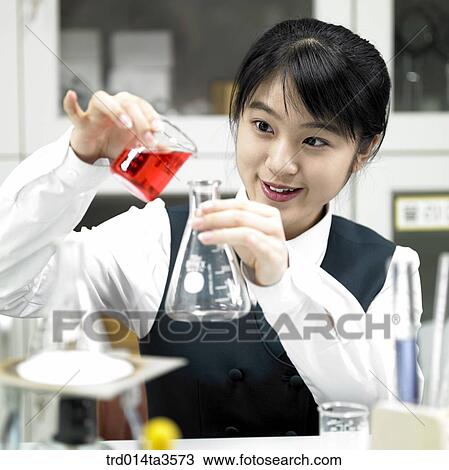 students in uniform doing chemistry experiment View Large Photo Image Stock Image - students in uniform doing chemistry experiment. Fotosearch