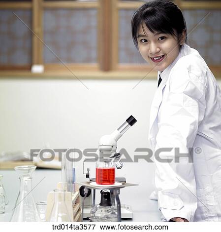 students in uniform doing chemistry experiment View Large Photo Image Stock Photo - students in uniform doing chemistry experiment. Fotosearch