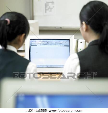 students in uniform taking computer class in school View Large Photo Image Stock Photography - students in uniform taking computer class in school. Fotosearch