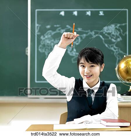 Stock Image - Students raising hands for answering. Fotosearch