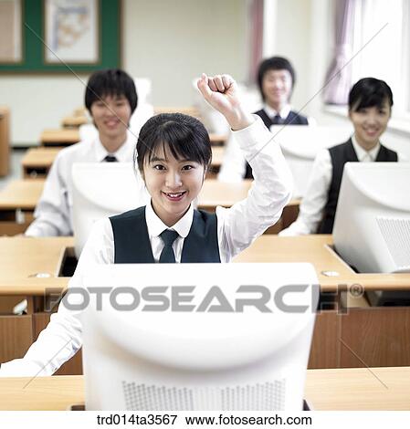 students raising hands in the computer lab View Large Photo Image Stock Photo - students raising hands in the computer lab. Fotosearch