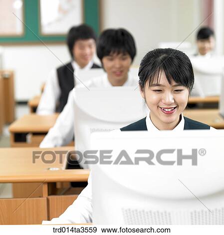 Stock Photo - Students studying in the computer lab. Fotosearch