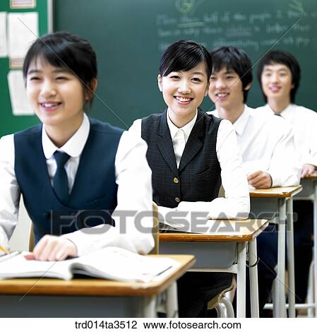 Students with smile taking class in the classroom View Large Photo Image Stock Image - Students with smile taking class in the classroom. Fotosearch