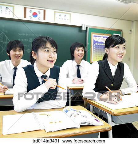 Studnets in uniform rasing hands for question View Large Photo Image Stock Image - Studnets in uniform rasing hands for question. Fotosearch
