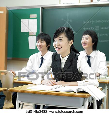 Studnets in uniform taking class in the calssroom View Large Photo Image Stock Photo - Studnets in uniform taking class in the calssroom. Fotosearch
