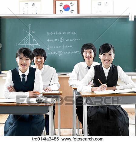 Studnets in uniform taking class in the calssroom View Large Photo Image Stock Photograph - Studnets in uniform taking class in the calssroom. Fotosearch