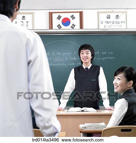 Studnets in uniform taking English class View Large Photo Image Stock Photograph - Studnets in uniform taking English class. Fotosearch