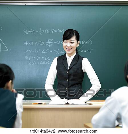 Stock Image - Studnets in uniform taking math class. Fotosearch
