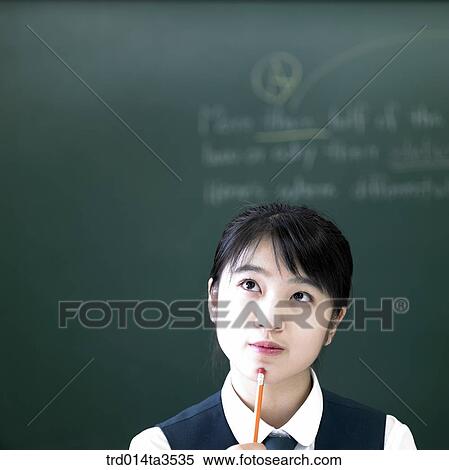 thinking students in uniform in the classroom View Large Photo Image Stock Photography - thinking students in uniform in the classroom. Fotosearch
