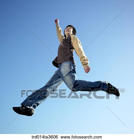 Student jumping with cheer View Large Photo Image Stock Photograph - Student jumping with cheer. Fotosearch