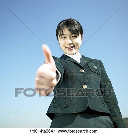 Teen with thumb up View Large Photo Image Stock Photo - Teen with thumb up. Fotosearch