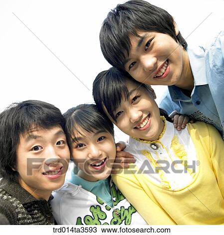 Teens with smile and putting their arms around the shoulders View Large Photo Image Stock Image - Teens with smile and putting their arms around the shoulders. Fotosearch
