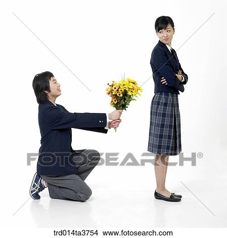 Boy confessing to girl View Large Photo Image Picture - Boy confessing to girl. Fotosearch