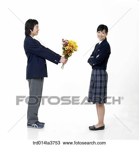 Boy confessing to girl View Large Photo Image Stock Image - Boy confessing to girl. Fotosearch