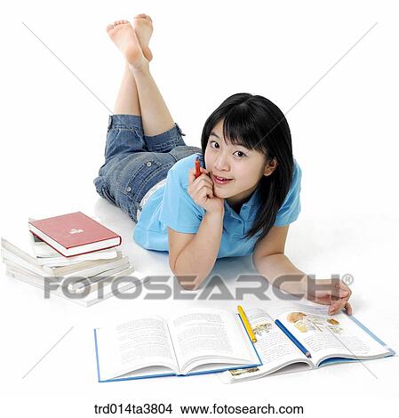 laying down teen girl studying View Large Photo Image Picture - laying down teen girl studying. Fotosearch