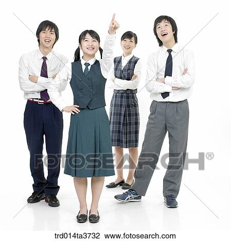 Teen girl pointing at sky andposing friends View Large Photo Image Stock Image - Teen girl pointing at sky andposing friends. Fotosearch
