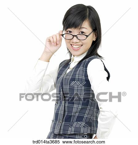 Teen girl with glasses posing for camera View Large Photo Image Stock Photography - Teen girl with glasses posing for camera. Fotosearch