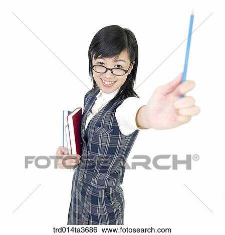Teen girl with glasses posing for camera with holding pencil View Large Photo Image Stock Photograph - Teen girl with glasses posing for camera with holding pencil. Fotosearch