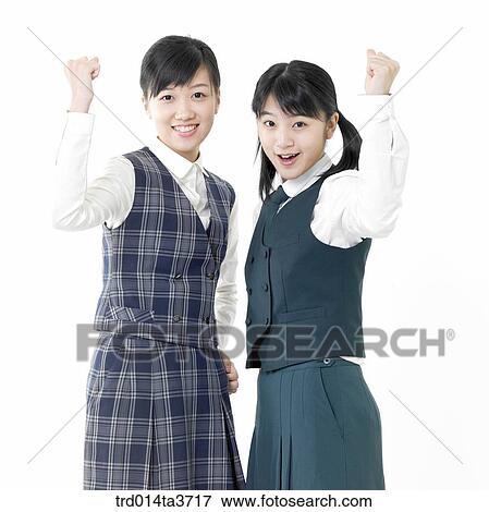 Teen girls making cheering pose View Large Photo Image Stock Photo - Teen girls making cheering pose. Fotosearch