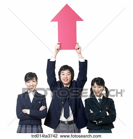 Teen holding arrow mark and posed friends View Large Photo Image Stock Image - Teen holding arrow mark and posed friends. Fotosearch