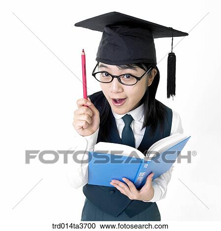 Stock Image - Teen in school uniform hold pencil and making expression of surprise. Fotosearch