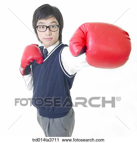 Teen in uniform doing boxing View Large Photo Image Stock Image - Teen in uniform doing boxing. Fotosearch