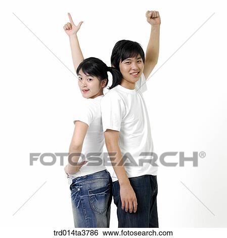 Stock Photograph - Teens doing stone and scissors. Fotosearch