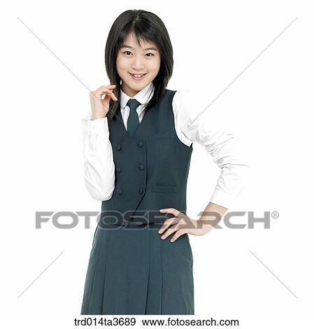 Stock Photo - Teens in school uniform posing for camera. Fotosearch