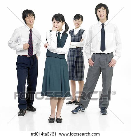 Stock Image - Teens in school uniform standing in a row. Fotosearch
