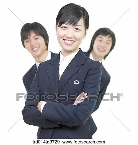 Stock Photo - Teens in school uniform standing in a row. Fotosearch