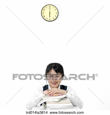 Teens in school uniform staying up night for studying View Large Photo Image Picture - Teens in school uniform staying up night for studying. Fotosearch