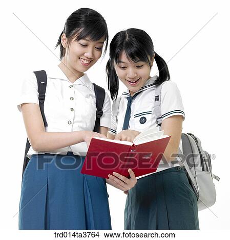 Teens in study View Large Photo Image Picture - Teens in study. Fotosearch
