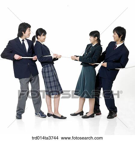 Teens in uniform play at a tug of war View Large Photo Image Picture - Teens in uniform play at a tug of war. Fotosearch